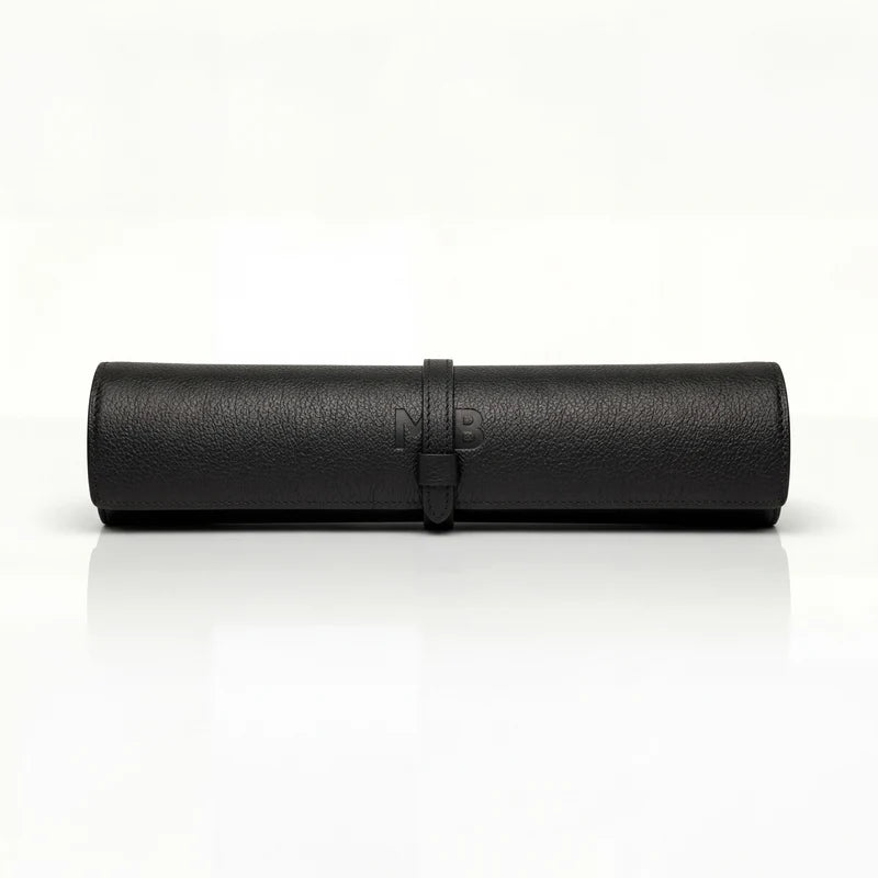 The Travel Backgammon rolled up, in Carbon Onyx